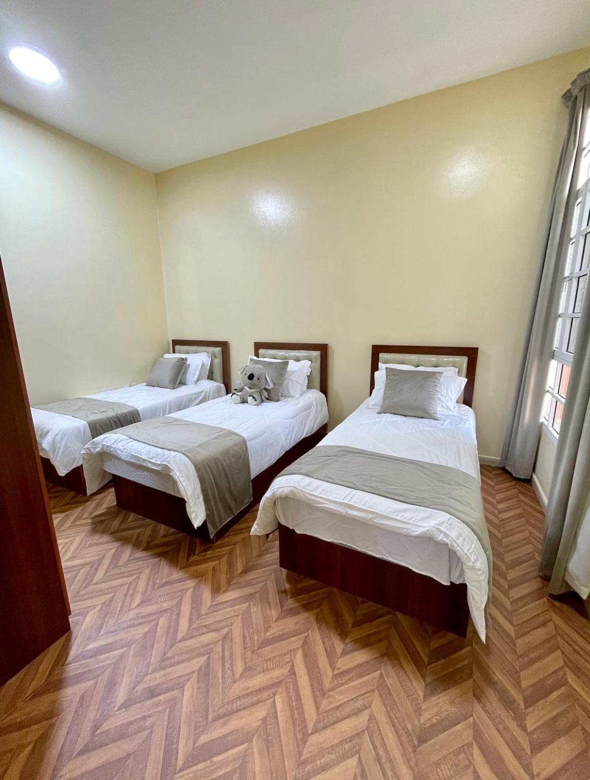 Deluxe Apartment مسقط المظهر الخارجي الصورة